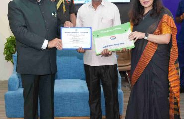 Governor felicitating drivers and people who help people in accidents (Good Samaritans) at the programme organised at Regional Transport Office located at Dehradun.