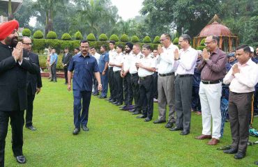Governor meeting the officers and employees of Raj Bhawan on the occasion of 79th Independence Day.