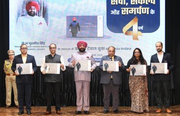 coffee table book titled “Four Years of Service, Resolution and Dedication”