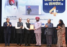 coffee table book titled “Four Years of Service, Resolution and Dedication”;?>