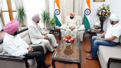 Members of the Sikh delegation meeting with the Governor .