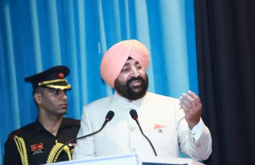 The Governor addressing a function held at the USI
