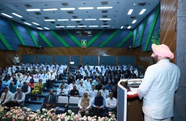 The Governor addressing a function held at the USI