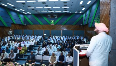 The Governor addressing a function held at the USI