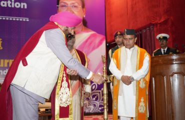 The Governor lighting the lamp to inaugurate the 20th Convocation of Kumaon University, Nainital.