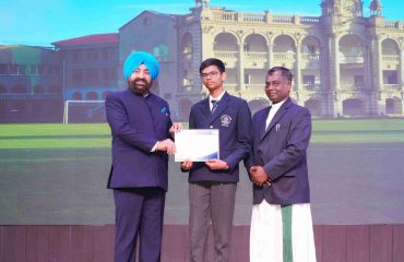 The Governor felicitating students at the 