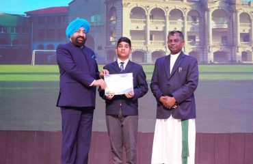 The Governor felicitating students at the 