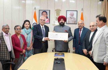 Officials of Reach organization meeting the Governor and giving presentation regarding the Heritage Mahotsav organized every year in Dehradun.