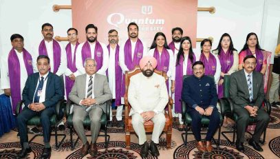 Governor with students receiving medals and degrees