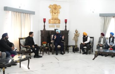⁠Local Sikh delegation presenting a portrait