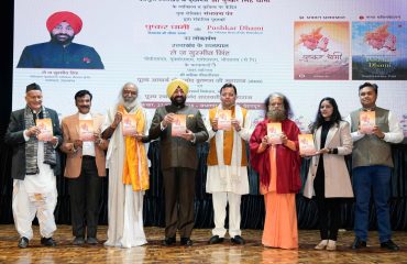 Governor and Chief Minister launching the books Pushkar Dhami: The Vibrant Heat of the Himalayas.