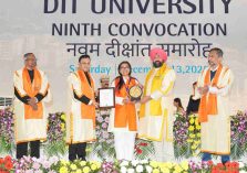 The Governor presenting a silver medal and degree to a female student of DIT University, Dehradun, at the 9th Convocation Ceremony.;?>