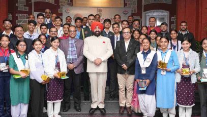 The Governor with students and teachers who returned from a Bharat Darshan (India tour) educational trip at Lok Bhavan.