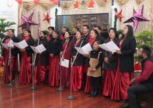 Church representatives performing soulful songs and carols at a program;?>