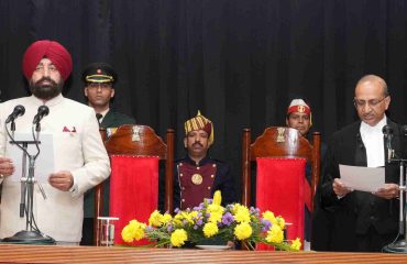 The Governor administering the oath of office to the newly appointed Chief Justice of the Uttarakhand High Court, Shri Manoj Kumar Gupta, at Lok Bhavan, Dehradun.