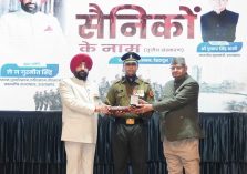 The Governor honoring a military officer at the 