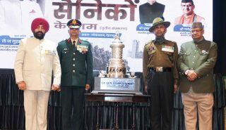 The Governor honoring military officers of the Kumaon Regimental Centre at the 