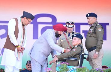 The Governor honoring police officers with medals for distinguished service on Republic Day.