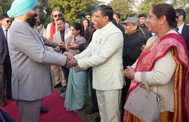 The Governor and Chief Minister meeting with dignitaries present at the 'At Home' program at Lok Bhavan