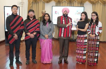 ⁠Governor honouring the girl students by presenting them mementos