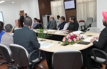 The Governor chairing the first meeting of the Board of Management