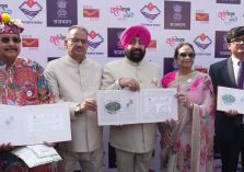 The Governor releasing a special postal cover on the theme of 