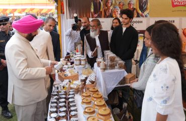 The Governor inspecting the flower exhibition and various stalls set up