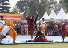 Students giving a live demonstration of rhythmic yoga at the Vasantotsav.