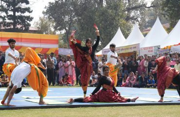 Students giving a live demonstration of rhythmic yoga at the Vasantotsav.