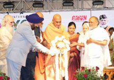 The Governor inaugurating the closing ceremony of the International Yoga Festival-2026, held in Rishikesh, by lighting the ceremonial lamp.