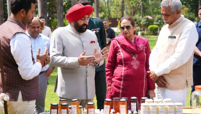 The Governor and the First Lady, Smt. Gurmeet Kaur, observing the honey bee processing