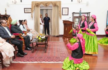 The Governor watching the captivating cultural performance presented by student