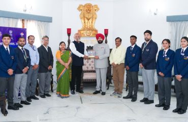 The Governor with National Service Scheme (NSS) volunteers.