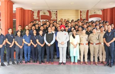 The Governor with security personnel at the badge presentation ceremony at Lok Bhavan.
