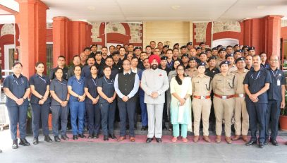 The Governor with security personnel at the badge presentation ceremony at Lok Bhavan.
