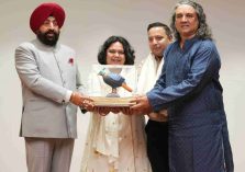 The Governor presenting mementos to the film's lead actor, Mr. Satish Sharma, director Mr. Raja Chatterjee, and producer Mrs. Sakshi Shail Chatterjee, at the special screening of the short film 'Misty'.