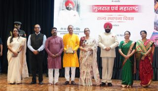 The Governor with the people present at the Gujarat and Maharashtra State Foundation Day program organized at Lok Bhavan.