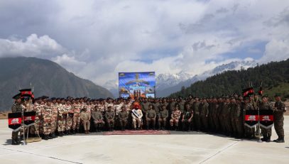 The Governor with Army personnel at the Sainik Sammelan held in Auli, Chamoli.