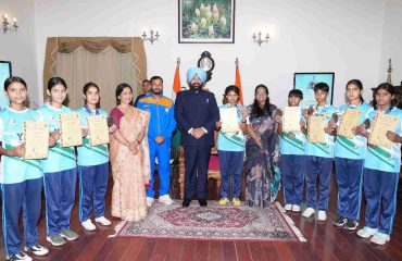 The Governor interacting with students from PM Shri Government Girls' Intermediate College; the medal winners in the Youth Games, during the event.
