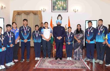 The Governor interacting with students from PM Shri Government Girls' Intermediate College; the medal winners in the Youth Games, during the event.