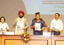 The Governor releasing a magazine on the occasion of the program titled 