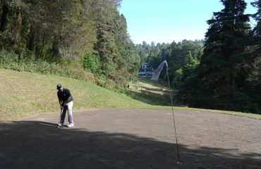 Golfers playing golf at the 21st Governors' Cup Golf Tournament, organized by the Lok Bhavan Golf Club.