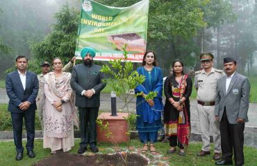 The Governor and the First Lady, Smt. Gurmeet Kaur, during a tree plantation drive at the Lok Bhavan, Nainital complex, on the occasion of World Environment Day.