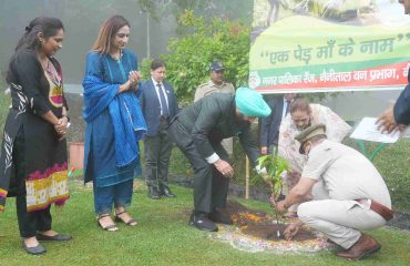 The Governor and the First Lady, Smt. Gurmeet Kaur, planting a Rudraksha sapling under the ‘Ek Ped Maa Ke Naam’ (A Tree in Mother’s Name) campaign at the Lok Bhavan, Nainital complex, on the occasion of World Environment Day.