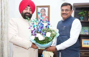 Chief Secretary Shri Anand Bardhan paying a courtesy call on the Governor.