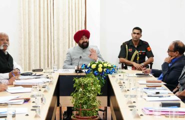 The Governor chairing a review meeting with the Vice-Chancellors of the state's public universities at Lok Bhavan.