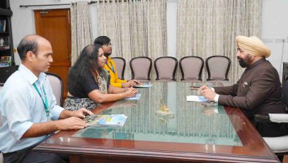 Regional Passport Officer, Dehradun, Smt. Malvika Priyadarshini, Senior Superintendent Shri Tarendra Singh, and Junior Translation Officer Shri Hivam Verma, interacting with the Governor.