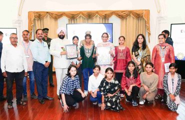 The Governor with students from various schools during the program held at Lok Bhavan on the auspicious occasion of Raksha Bandhan.