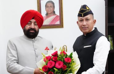 Newly appointed Director of Sainik Welfare, Brigadier B.S. Basera (Retd.), paying a courtesy call on the Governor.