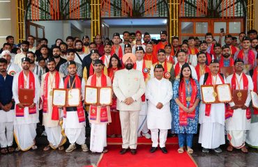 The Governor with students on the occasion of the 12th Convocation of Uttarakhand Sanskrit University.
